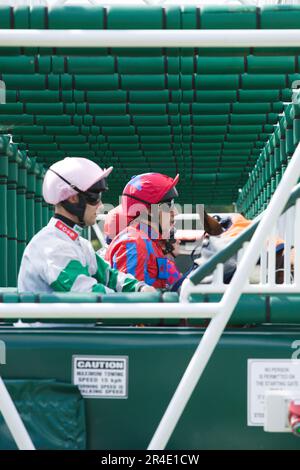 York, UK. 27th May 2023. Jockeys Jason Hart and James Sullivan waiting in the starting gates at York Races. Credit: Ed Clews/Alamy Live News. Stock Photo