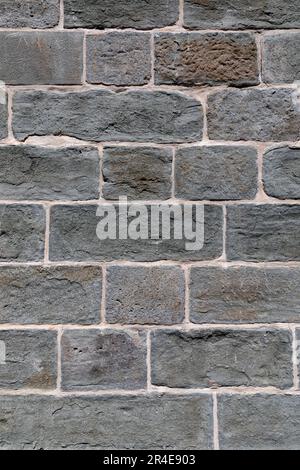 Close-up of natural stone wall. Stock Photo