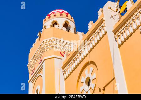 Minaret and dome of the mosque. The Central Mosque, or aljama mosque, is the largest in the Spanish city of Melilla. Located in the Modernista Ensanch Stock Photo