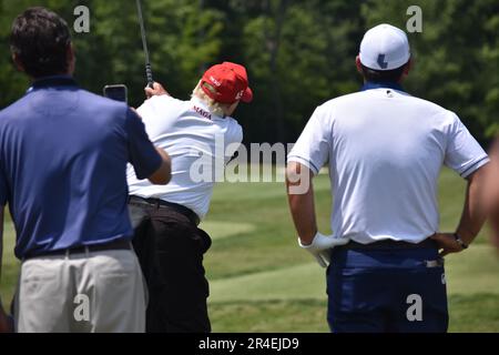 Sterling, United States. 27th May, 2023. Former President of the United States Donald J. Trump swings his put and golfs at the driving range. Former President of the United States Donald J. Trump visits the driving range, meets fans and watches LIV Golf Washington DC 2023 Round 2 at Trump National Golf Club Washington DC in Sterling, Virginia, United States. Credit: SOPA Images Limited/Alamy Live News Stock Photo