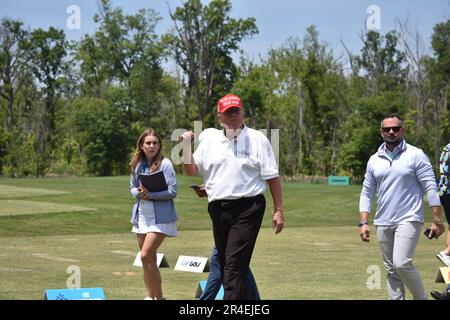 Sterling, United States. 27th May, 2023. Former President of the United States Donald J. Trump walks by fans and talks with them. Former President of the United States Donald J. Trump visits the driving range, meets fans and watches LIV Golf Washington DC 2023 Round 2 at Trump National Golf Club Washington DC in Sterling, Virginia, United States. Credit: SOPA Images Limited/Alamy Live News Stock Photo