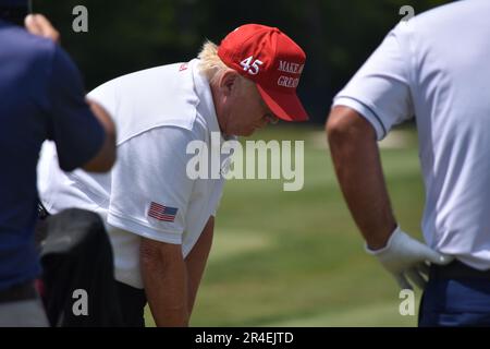 Sterling, United States. 27th May, 2023. Former President of the United States Donald J. Trump swings his put and golfs at the driving range. Former President of the United States Donald J. Trump visits the driving range, meets fans and watches LIV Golf Washington DC 2023 Round 2 at Trump National Golf Club Washington DC in Sterling, Virginia, United States. (Photo by Kyle Mazza/SOPA Images/Sipa USA) Credit: Sipa USA/Alamy Live News Stock Photo
