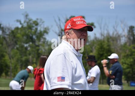 Sterling, United States. 27th May, 2023. Former President of the United States Donald J. Trump says hello to a fan at the driving range. Former President of the United States Donald J. Trump visits the driving range, meets fans and watches LIV Golf Washington DC 2023 Round 2 at Trump National Golf Club Washington DC in Sterling, Virginia, United States. (Photo by Kyle Mazza/SOPA Images/Sipa USA) Credit: Sipa USA/Alamy Live News Stock Photo