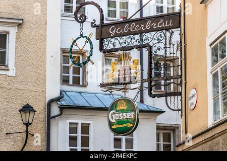 Forks and a brew kettle adorn the nose module of Gabler-Bräu on Stefan Zweig Platz, which now belongs to the Gösser Beer Group. The Gabler-Bräu is the birthplace of the singer Richard Mayr Stock Photo
