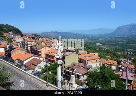 A beautiful, clear skies landscape of 'Castel San Lorenzo', Italy, with a visible angel artwork built in 1799. Stock Photo