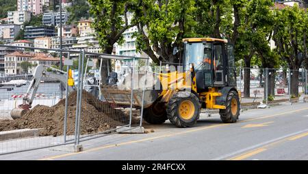 banner or excavator repairing the city street Stock Photo
