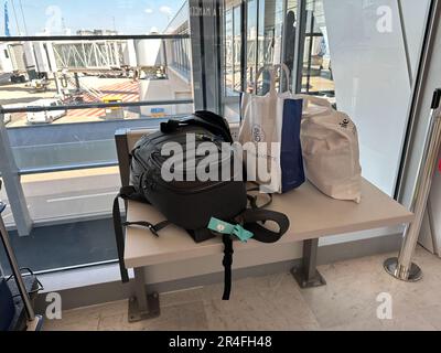 Paris, Paris, France. 25th May, 2023. Camera bag and baguette bag with Airplane walkway in the background ''” at Paris Charles de Gaulle airport (Credit Image: © Amy Katz/ZUMA Press Wire) EDITORIAL USAGE ONLY! Not for Commercial USAGE! Stock Photo