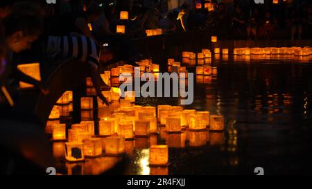 Houston, USA. 27th May, 2023. People attend the Water Lantern Festival held in Houston, Texas, the United States, May 27, 2023. Credit: Xu Jianmei/Xinhua/Alamy Live News Stock Photo