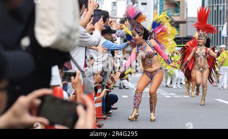 Dancers of the samba team perform passionate dance during Kobe 