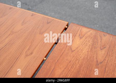 A mid century teak dining table 50s 60s Danish Design Vintage Dining solid wood Modern antique retro original isolated on white wall in modern Stock Photo