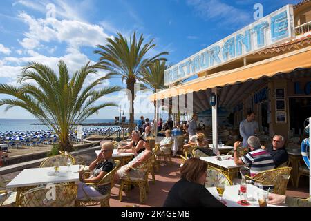 Restaurant on the beach promenade Playa de las Vistas in Los Christianos, Tenerife, Canary Islands, Spain Stock Photo