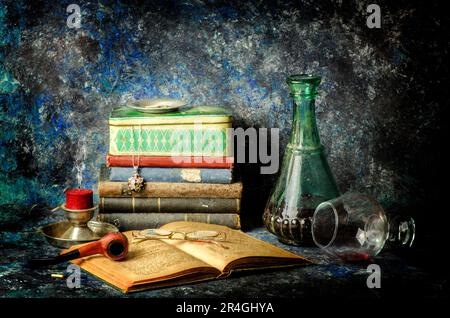 Classic still life with old books, antique glass bottle full of drink ,pipe, candle, old box, glasses placed together on vintage background.. Stock Photo