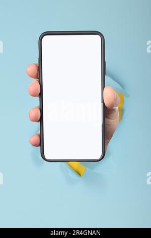 cute boy child showing smartphone with white blank screen Stock Photo