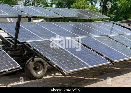 Mobile solar farm, solar energy panels installed on trailer. Stock Photo