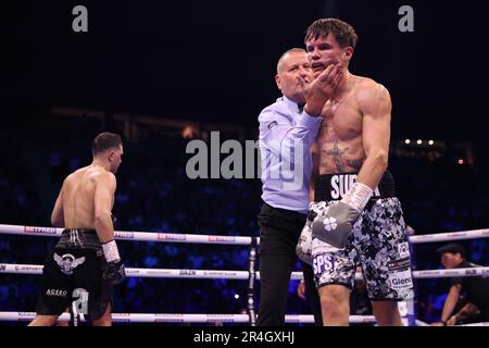 AO Arena, Manchester, UK. 27th May, 2023. WBA Featherweight Championship Boxing; Mauricio Lara versus Leigh Wood; The undercard fight as Darragh Foley is spoken to by the referee Credit: Action Plus Sports/Alamy Live News Stock Photo