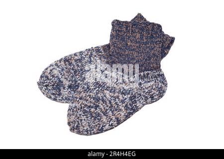 Knitted wool, handmade socks on a white background Stock Photo