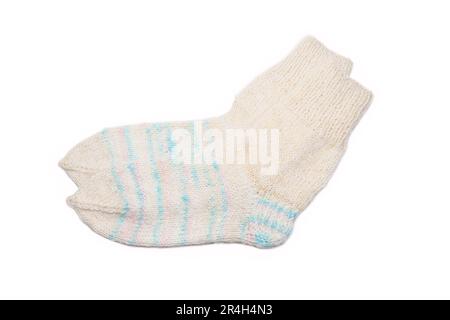 Knitted wool, handmade socks on a white background Stock Photo