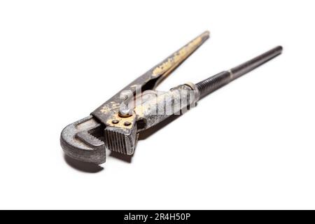 Adjustable wrench, old, shabby, isolated on white background Stock Photo