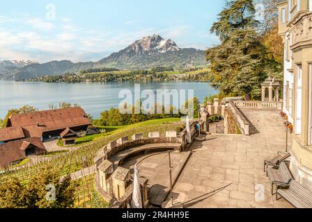 Terrace at Schloss Meggen, a  castle overlooking Lake Lucerne with Mt.Pilatus in Background, Switzerland Stock Photo