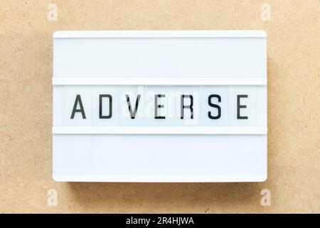 Lightbox with word adverse on wood background Stock Photo