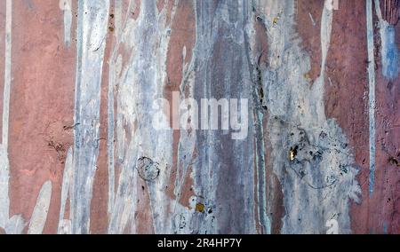 Abstract streaks of faded paint on a metal surface Stock Photo