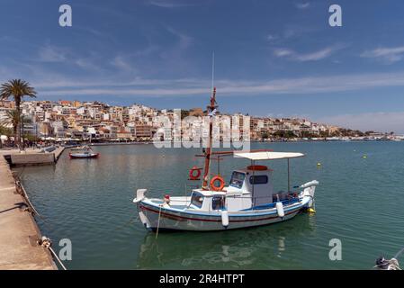 Eastern Crete, Greece, Europe. 2023,  Waterfront of Siteia harbour in Eastern Crete with its small boats, hotels and restaurants on the seafront Stock Photo