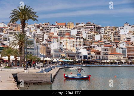 Eastern Crete, Greece, Europe. 2023,  Waterfront of Siteia harbour in Eastern Crete with its small boats, hotels and restaurants on the seafront Stock Photo