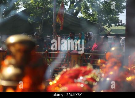 May 28,2023, Srinagar Kashmir, India : Kashmiri Pandit (Hindu) devotees pray during a religious festival at Kheer Bhawani temple at Tullamulla Ganderbal, some 28 kilometers northeast of Srinagar. Hundreds of devotees attended the prayers in the temple that is dedicated to the Hindu goddess Kheer Bhawani. on May 28,2023 in Srinagar Kashmir, India. (Credit Image: © Firdous Nazir/eyepix via ZUMA Press Wire) EDITORIAL USAGE ONLY! Not for Commercial USAGE! Stock Photo