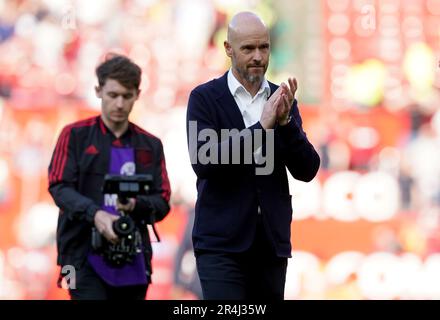 Manchester United Head Coach, Erik ten Hag, applauds supporters following the Premier League match at Old Trafford, Manchester. Picture date: Sunday May 28, 2023. Stock Photo