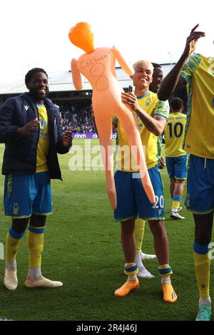 Nottingham Forest's Brennan Johnson (3rd from left) holding a inflatable doll after the Premier League match at Selhurst Park, London. Picture date: Sunday May 28, 2023. Stock Photo