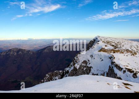 The view from Suva Planina to the snowy peaks of Stara Planina Stock Photo