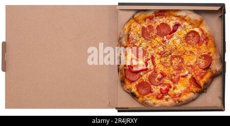 Pepperoni pizza with salami in an open box isolated on white background. Top view. Italian traditional food. Stock Photo