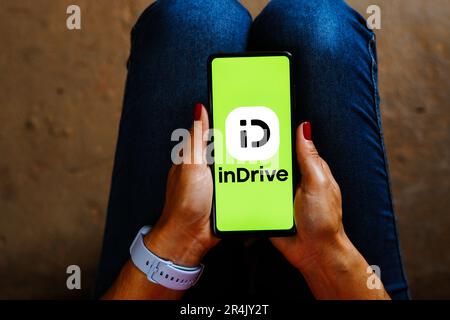 In this photo illustration, the inDrive logo is displayed on a ...