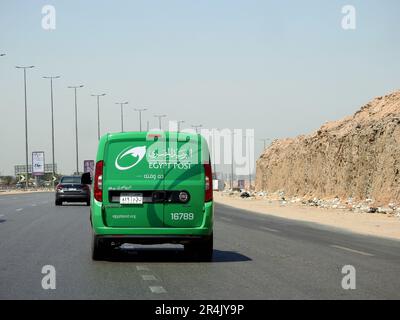 Cairo, Egypt, May 10 2023: Egyptian post delivery truck van mobile car service on the highway road, Egypt post is Egyptian agency responsible for post Stock Photo