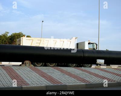 Cairo, Egypt, May 18 2023: preparations to place large water pipe parts in place, sanitation pipes, improvement of infrastructure and real estate deve Stock Photo