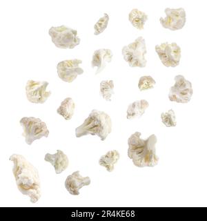 Many fresh cauliflower florets falling on white background Stock Photo