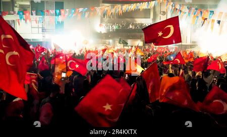 Izmir, Turkey. 28th May, 2023. AK Party supporters' election celebration in front of the AK Party Izmir Provincial Presidency. President Recep Tayyip Erdogan has won Turkey's presidential election five more years, defeating opposition leader Kemal Kilicdaroglu. With 99.43% of the votes counted, preliminary official results announced by Turkey's Supreme Election Council on Sunday showed Erdogan winning with 52.14% of the votes. Kilicdaroglu received 47.86%. (Photo by ?dil Toffolo/Pacific Press) Credit: Pacific Press Media Production Corp./Alamy Live News Stock Photo