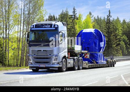 Silver Volvo FH16 truck transports Sandvik Pantera DP1100i