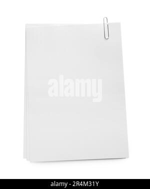 Blank sheets of paper with clip on white background, top view Stock Photo
