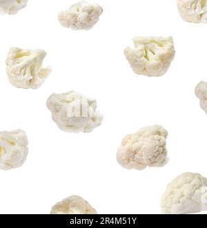 Many fresh cauliflower florets falling on white background Stock Photo