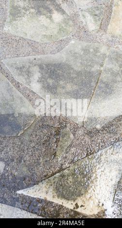 Contrast between dirty patio high pressure paving cleaning floor clean pressured washed before and after wash Stock Photo
