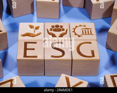 ESG symbols on wooden cubes as a concept of the environmental conservation principles Stock Photo
