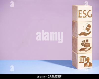 Environmental, Governance and Social symbols on wood blocks as concept of ESG principles Stock Photo