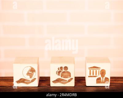 ESG symbols on wooden board as a concept of the environmental conservation principles Stock Photo