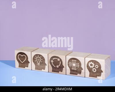 Power skills symbols on wooden cubes as management evolution concept Stock Photo