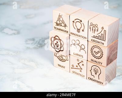 Core values symbols on wood blocks Stock Photo