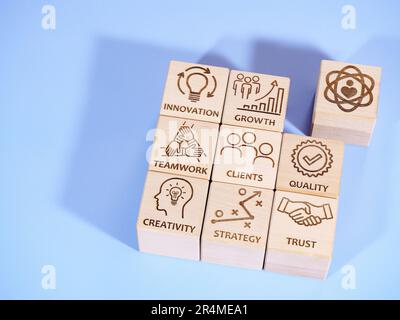 Symbols of core corporate values on wooden cubes Stock Photo