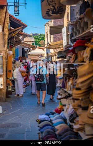 View of busy street in Old Rhodes Town, City of Rhodes, Rhodes, Dodecanese Islands, Greek Islands, Greece, Europe Stock Photo