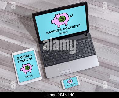Savings account concept shown on different information technology devices Stock Photo