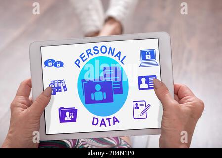 Personal data concept shown on a tablet held by a woman Stock Photo